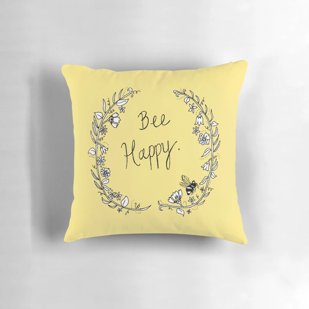 Bee-themed decorative throw pillow with floral and nature-inspired design