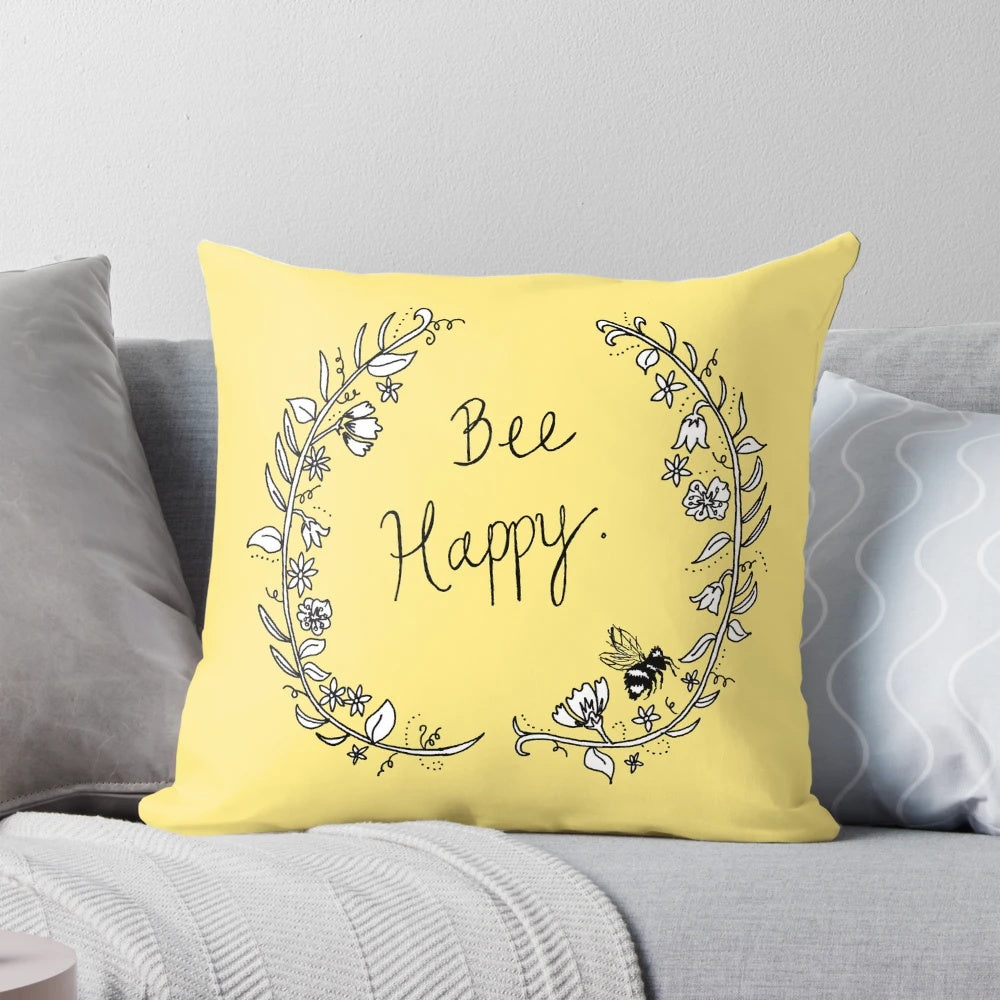 Bee-themed decorative throw pillow with floral and nature-inspired design