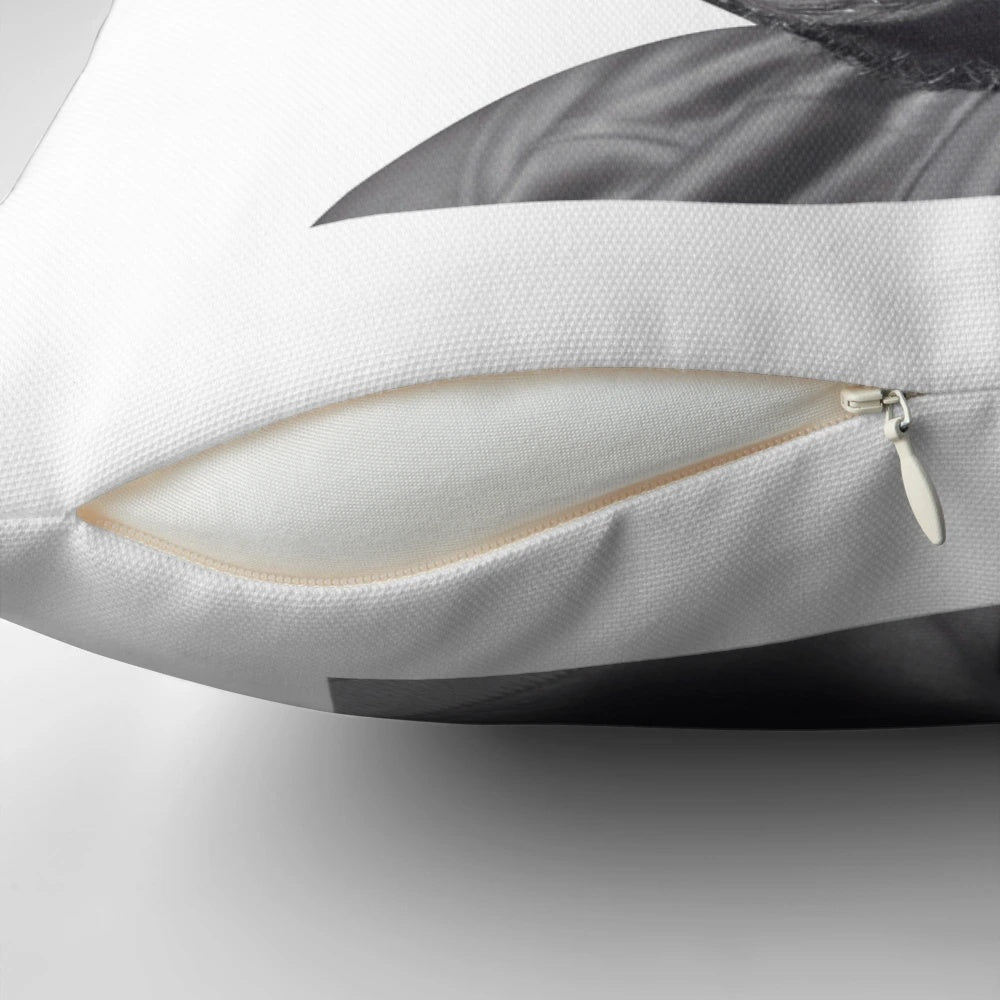 A pillow featuring the character Lester Green from the movie Beetlejuice.