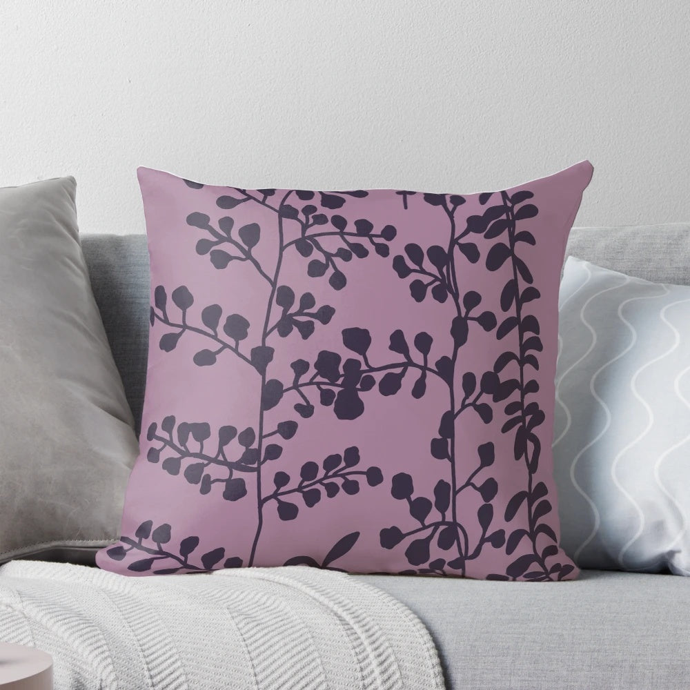 A plush, purple pillow featuring a Bella Swan-inspired print from the Twilight saga.