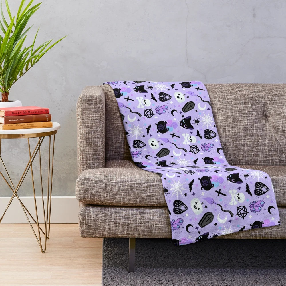 Cute witch plush blanket with pastel goth and kawaii halloween design