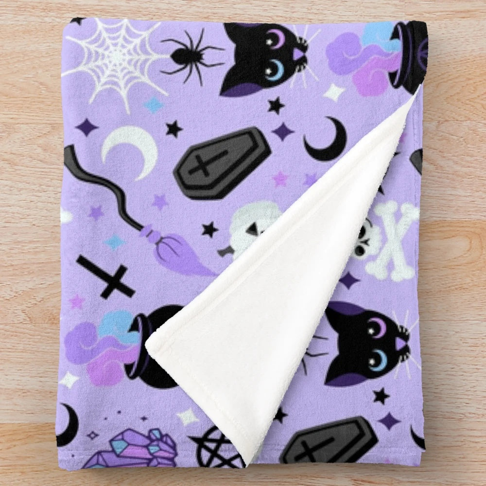 Cute witch plush blanket with pastel goth and kawaii halloween design