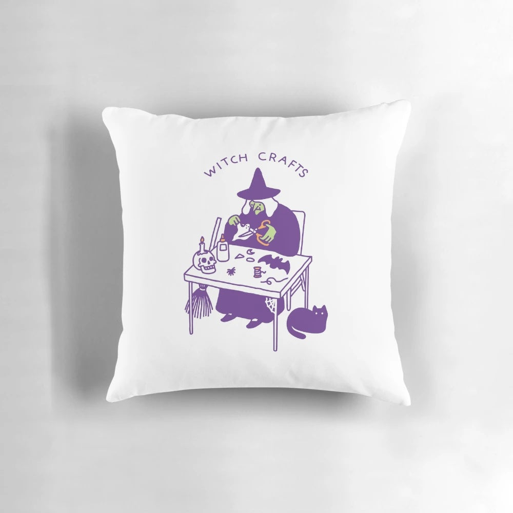Witch-themed decorative throw pillow featuring a cute cartoon witch design