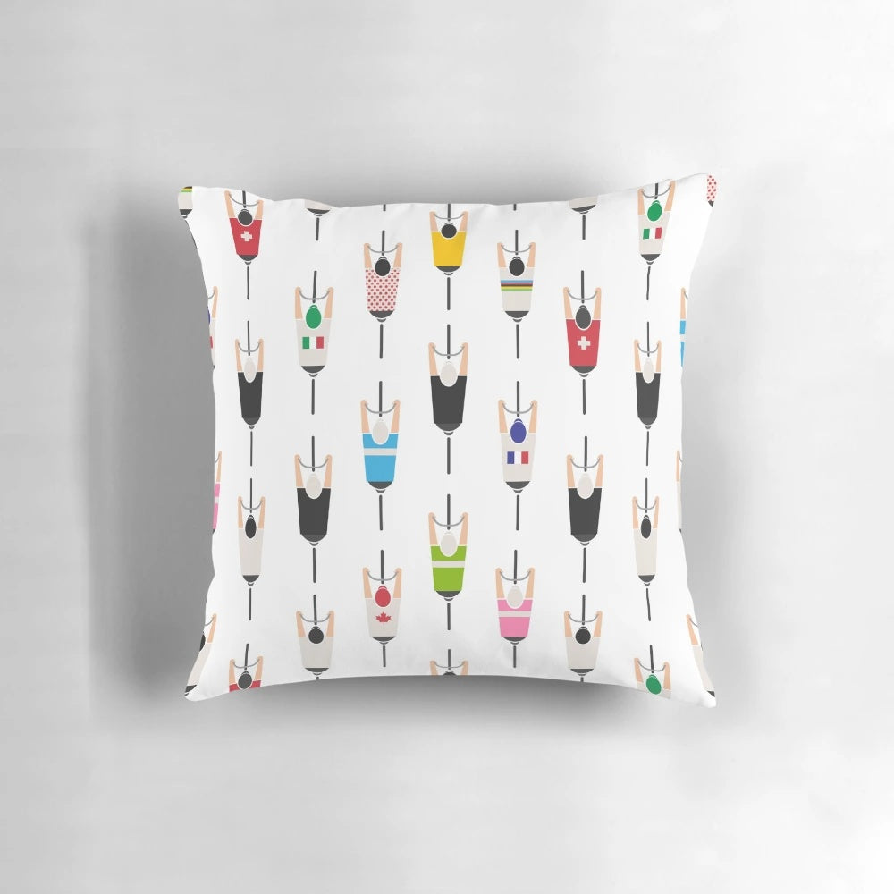 Bicycle squad graphic pillow with silhouette design of bikers on a road.