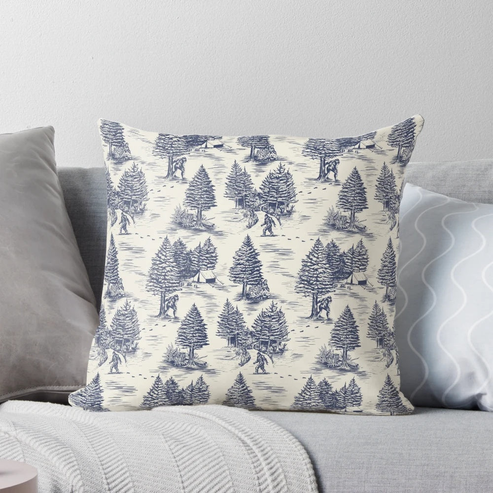 Throw pillow featuring a blue and white Toile de Jouy style pattern with a Bigfoot/Sasquatch design