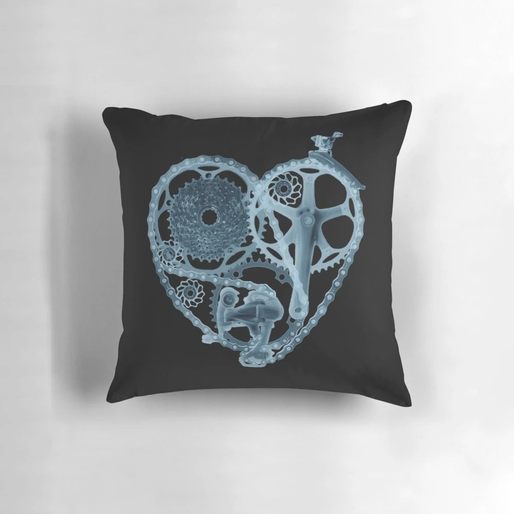 Soft, plush pillow featuring a bike lover's x-ray heart design