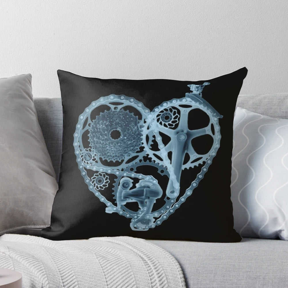 Soft, plush pillow featuring a bike lover's x-ray heart design