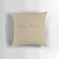 A cozy and stylish pillow featuring lyrics and art inspired by Billie Eilish's album 'Happier Than Ever