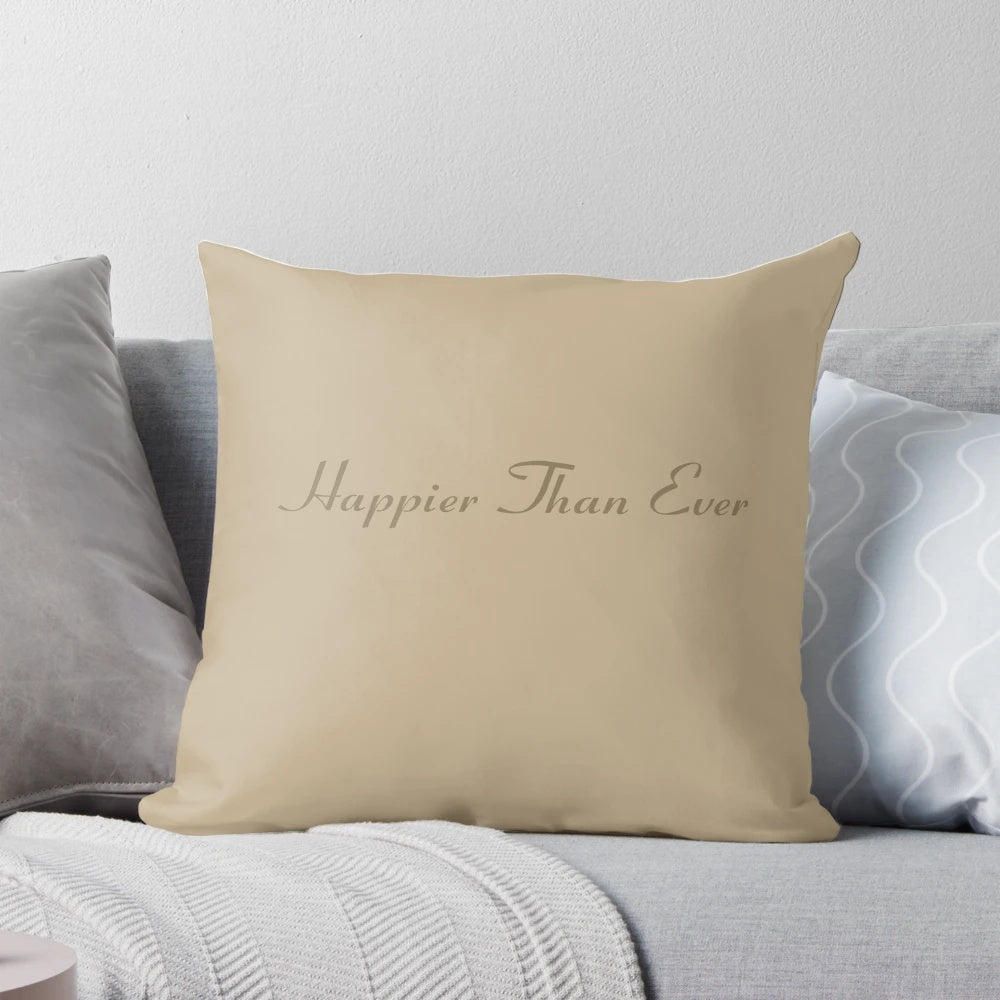 A cozy and stylish pillow featuring lyrics and art inspired by Billie Eilish's album 'Happier Than Ever