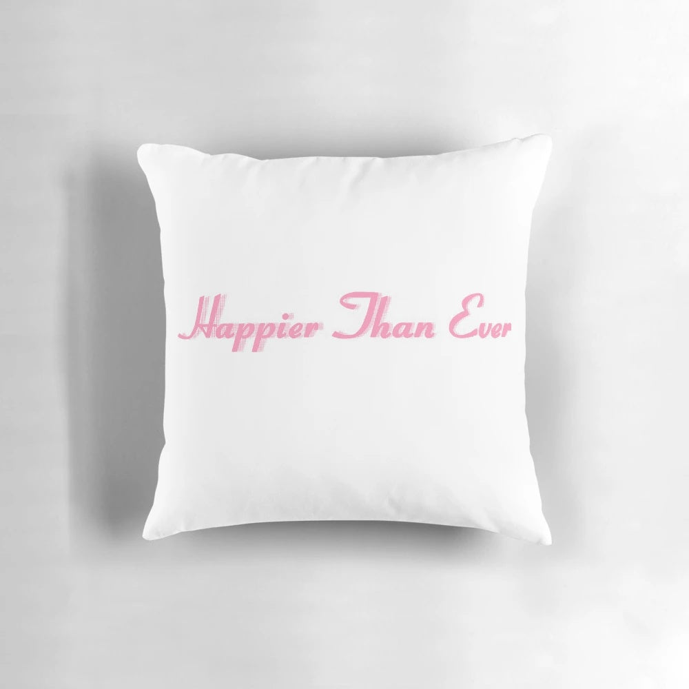 A stylish pink Billie Eilish 'Happier Than Ever' themed pillow with calligraphic lettering and a pop art design.