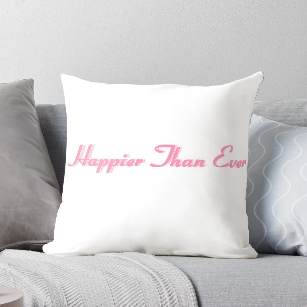 A stylish pink Billie Eilish 'Happier Than Ever' themed pillow with calligraphic lettering and a pop art design.