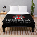 Biohazard themed executive plush blanket with Umbrella Corporation logo
