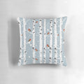 Cozy pillow featuring a snowy birch tree forest with a red-breasted robin bird, perfect for nature enthusiasts