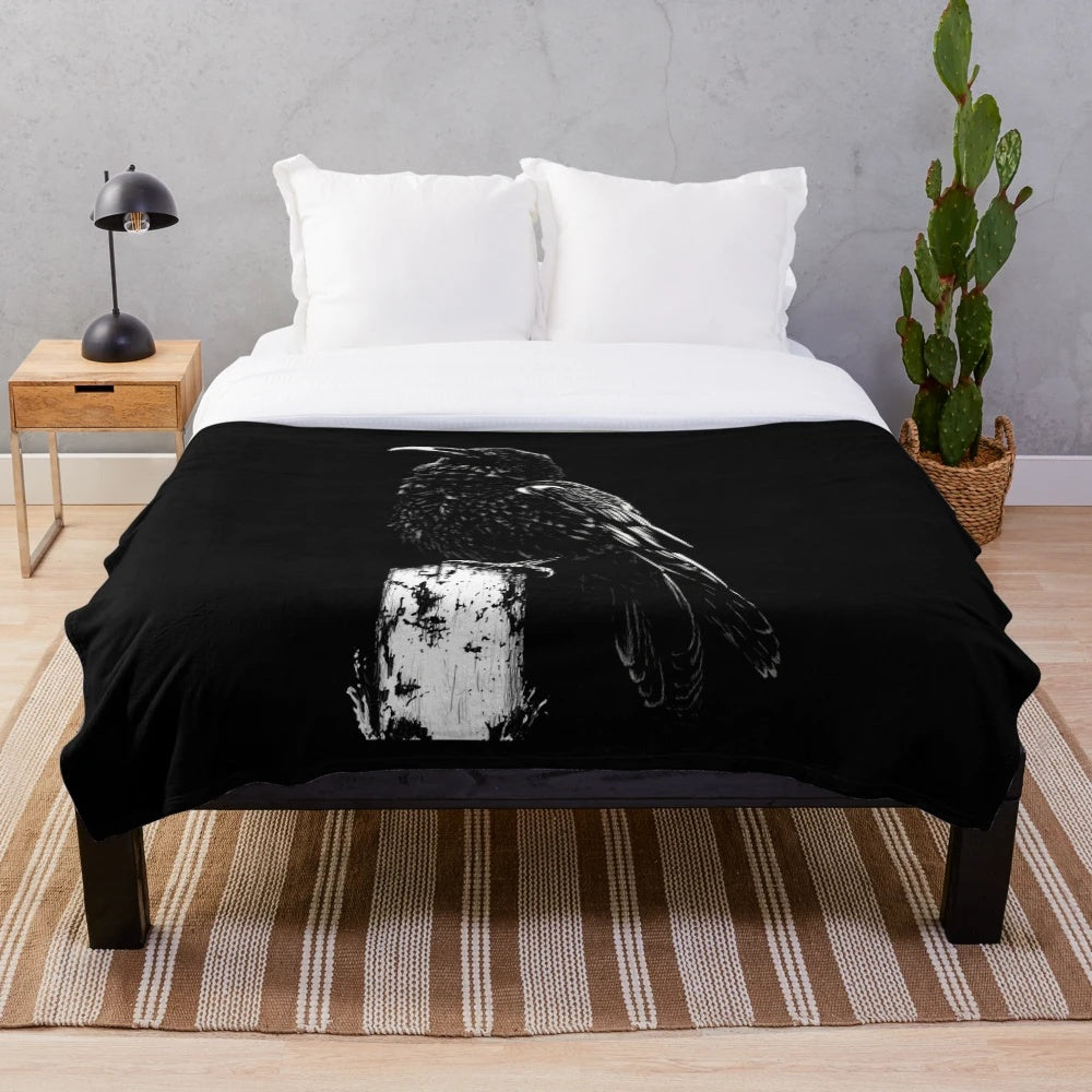 Black and white plush blanket with a raven design, inspired by the gothic literature of Edgar Allan Poe