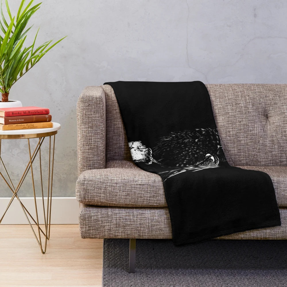 Black and white plush blanket with a raven design, inspired by the gothic literature of Edgar Allan Poe