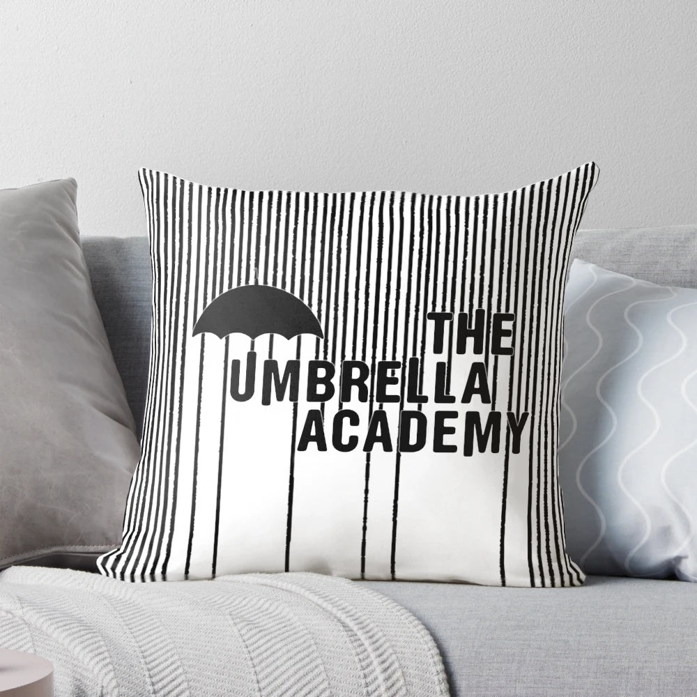 Black and white graphic design inspired by The Umbrella Academy logo on a decorative throw pillow