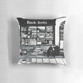 Black Books TV show inspired ink painting of shop front on a pillow, featuring characters Bernard Black and Manny.