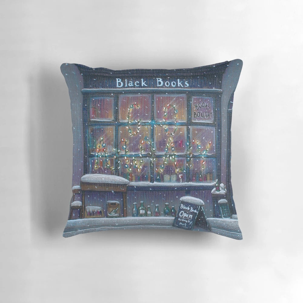 Black Books-themed Christmas pillow with humorous design