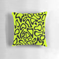 Black decorative pillow featuring a stylized pattern inspired by Lando Norris' Formula 1 helmet