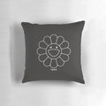 Black mask with a smiling flower design, inspired by hypebeast style