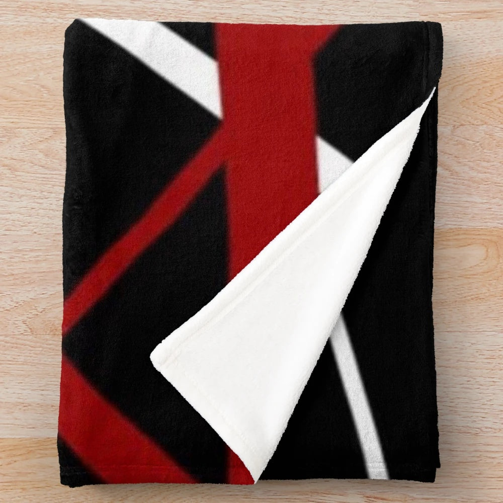 Black plush blanket with a van design as a tribute to the late Eddie Halen