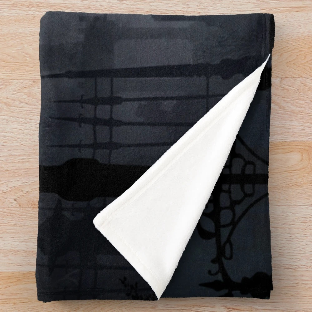 Bloodborne-inspired plush blanket featuring warrior landscapes