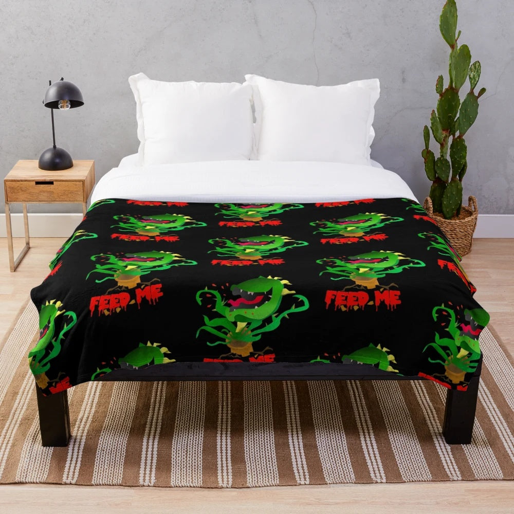 Bloodthirsty Plush Blanket inspired by the carnivorous plant Audrey II from Little Shop of Horrors