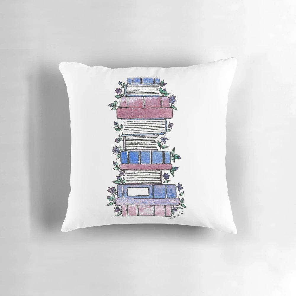 Vibrant floral pillow with open book design, perfect for book lovers