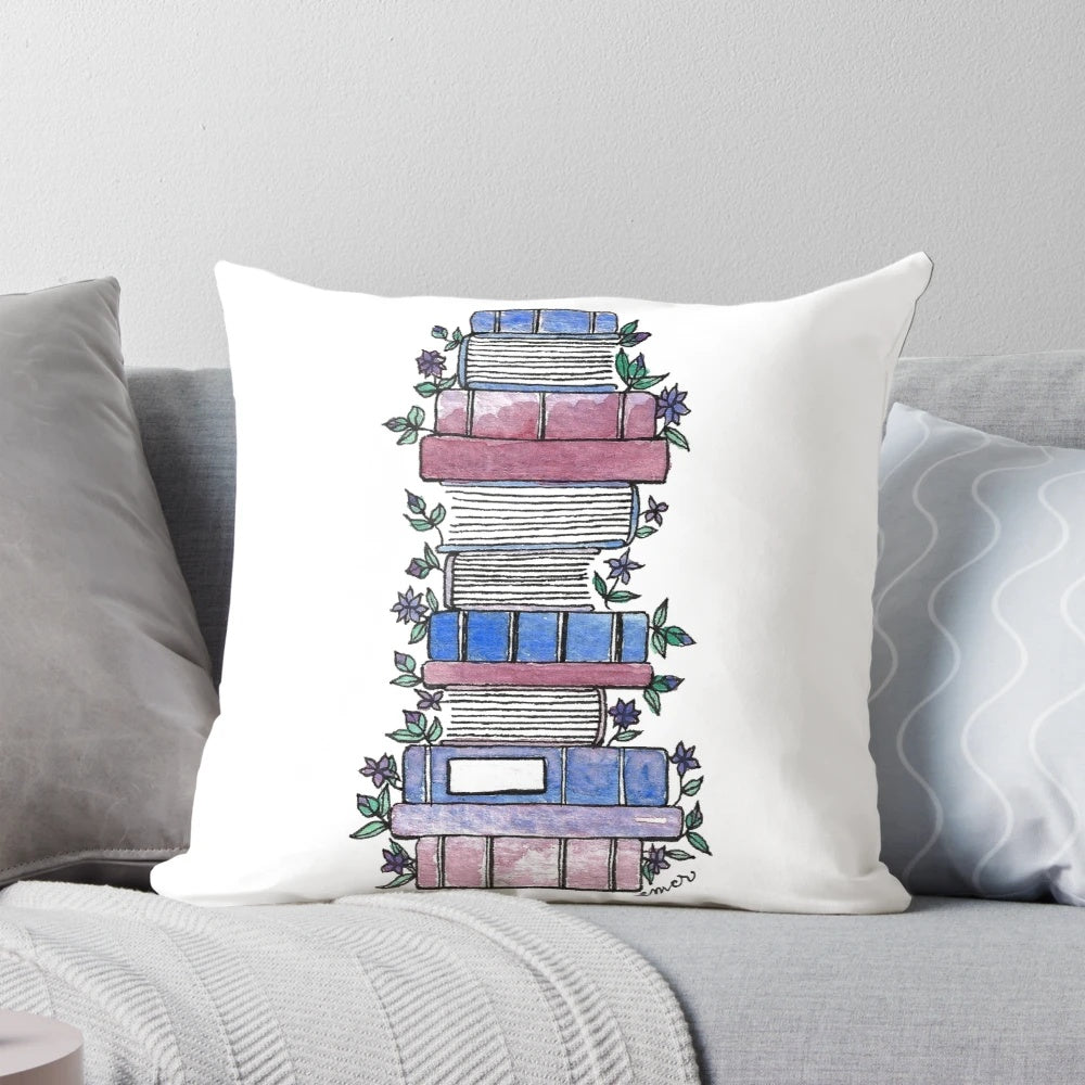 Vibrant floral pillow with open book design, perfect for book lovers