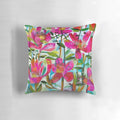 A vibrant and feminine floral pillow featuring a beautiful bouquet of summer roses in shades of pink.