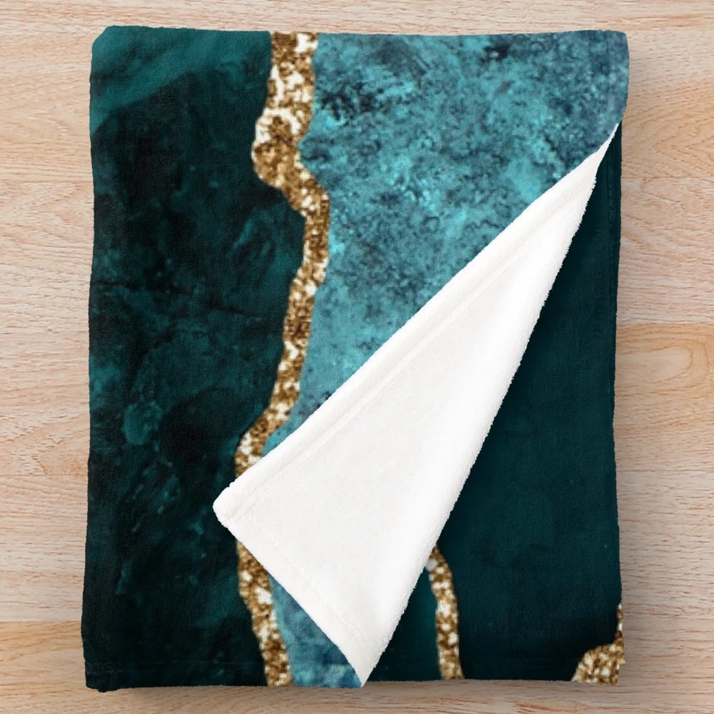Blue and teal faux malachite marble plush blanket with a modern, abstract design