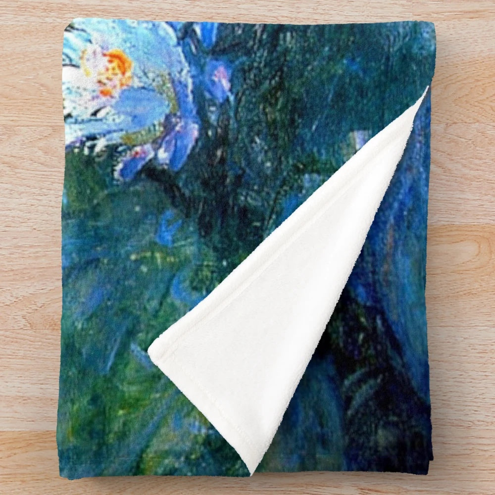 Blue and white floral plush blanket featuring Monet's water lilies painting
