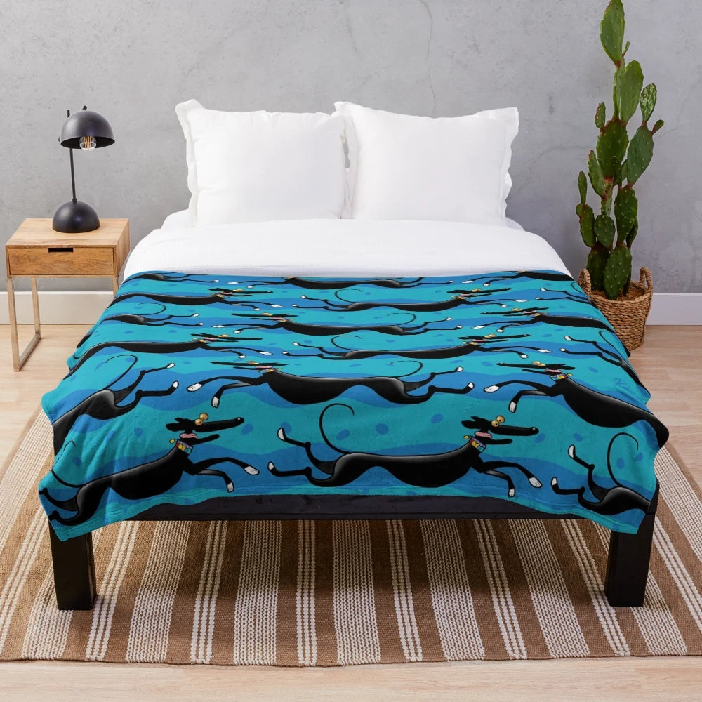 Blue plush blanket featuring a cartoon design of greyhounds, whippets, and lurchers