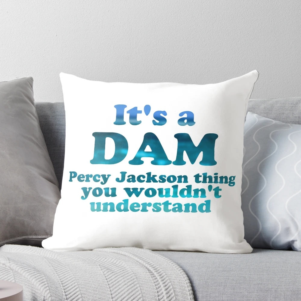 Blue writing pillow with "It's a Dam Percy Jackson Thing" text, inspired by the Percy Jackson book series.