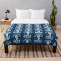 Plush blanket with "Bluffing Beats Everything" text and poker-themed design