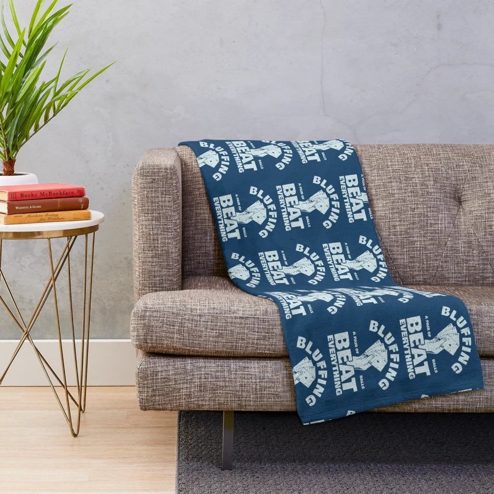 Plush blanket with "Bluffing Beats Everything" text and poker-themed design