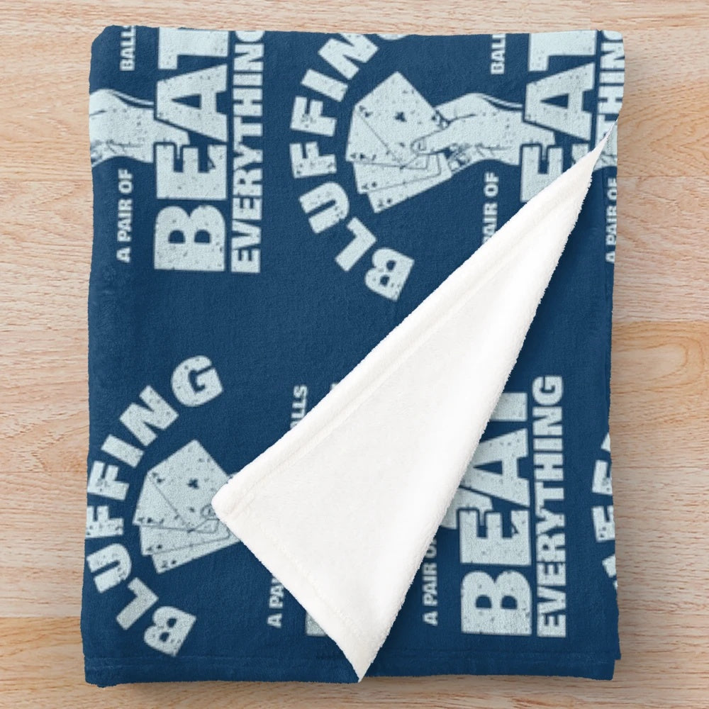 Plush blanket with "Bluffing Beats Everything" text and poker-themed design