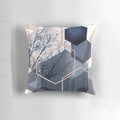 Abstract landscape pillow featuring a modern hexagon pattern in soft pastel shades of blush pink and navy blue.