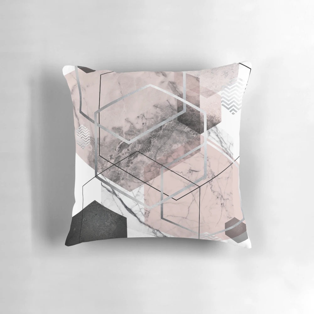 Blush pink and grey scandinavian geometric throw pillow with a minimalist textured triangle design