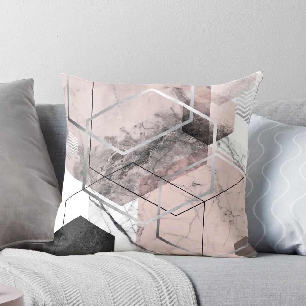 Blush pink and grey scandinavian geometric throw pillow with a minimalist textured triangle design