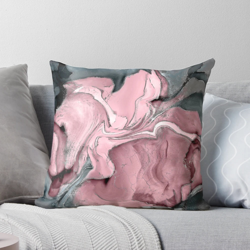 A beautiful blush rose watercolor pillow with pastel pinks, greys, and metallic accents.