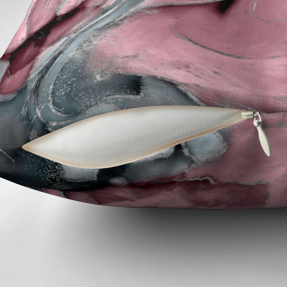 A beautiful blush rose watercolor pillow with pastel pinks, greys, and metallic accents.