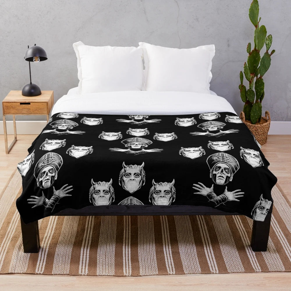 Bohemian-inspired plush blanket featuring dark metal imagery