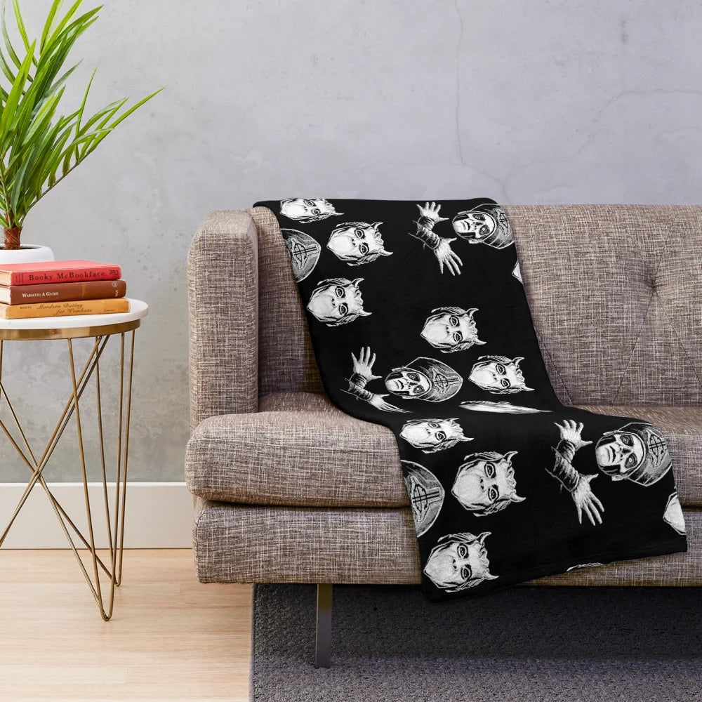Bohemian-inspired plush blanket featuring dark metal imagery
