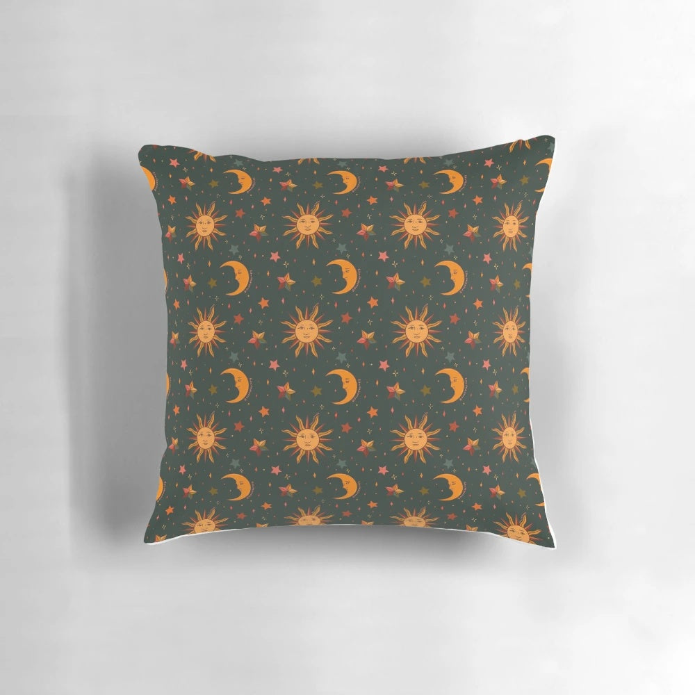 Teal pillow with a folk moon and star pattern, perfect for a boho, witchy, or astrology-inspired space.