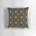Teal pillow with a folk moon and star pattern, perfect for a boho, witchy, or astrology-inspired space.