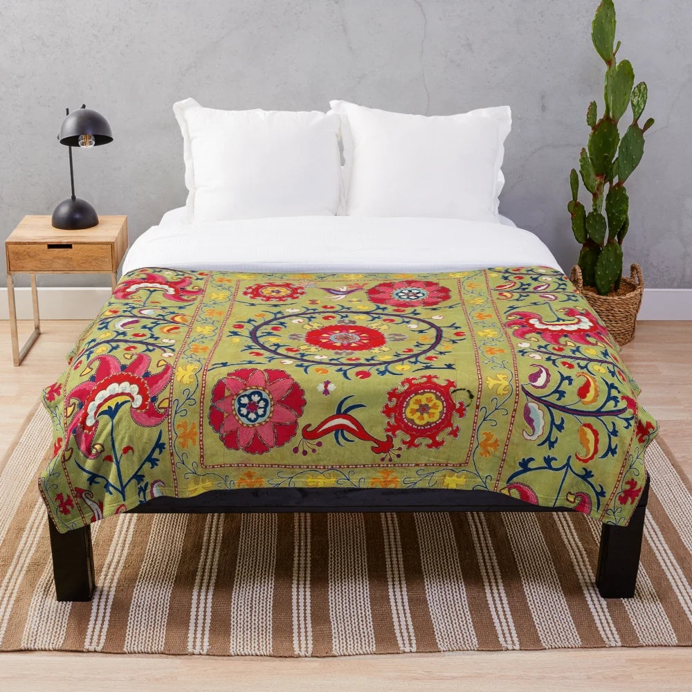 Floral embroidered plush blanket in bohemian, ethnic, and tribal design
