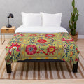 Floral embroidered plush blanket in bohemian, ethnic, and tribal design