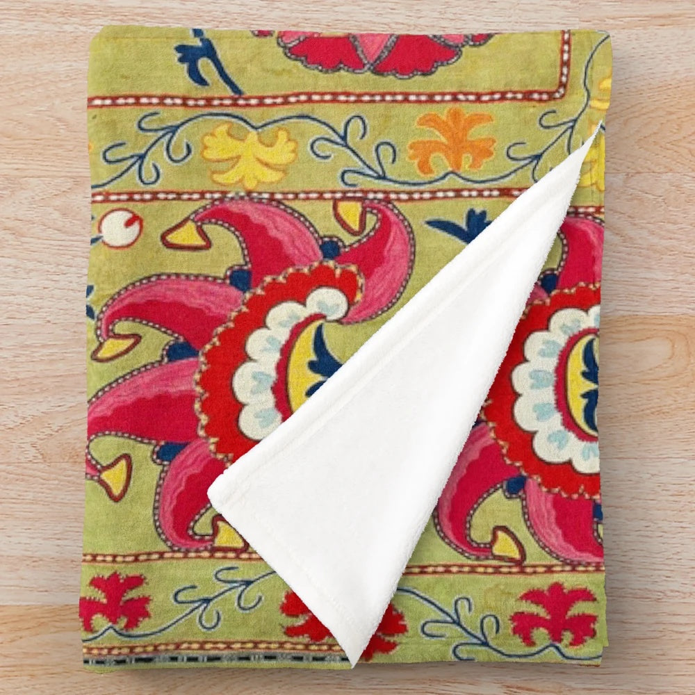 Floral embroidered plush blanket in bohemian, ethnic, and tribal design