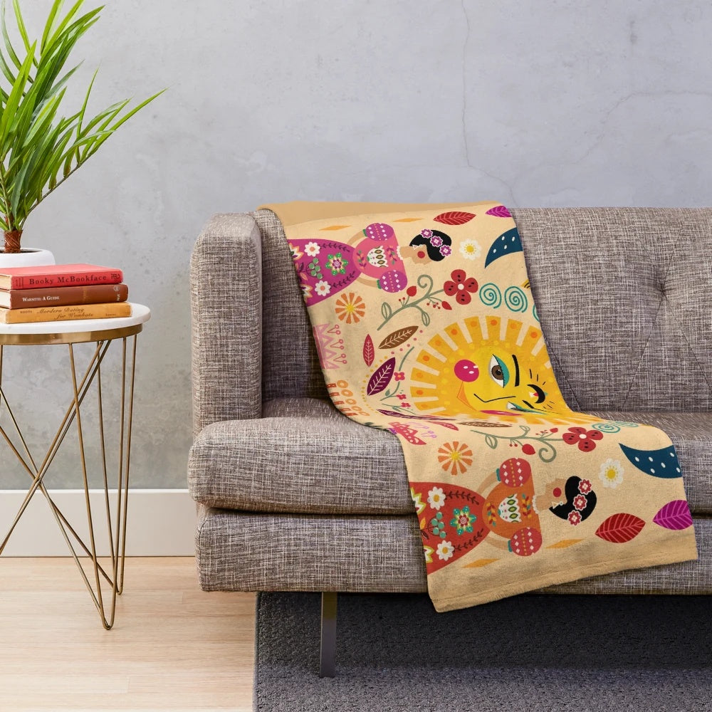 Colorful Frida Kahlo inspired plush blanket with floral and folk art designs